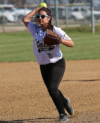 Image: Second-baseman Ashlyn Jacinto(6) fields a ground ball and then throws an Itasca runner out at first-base.