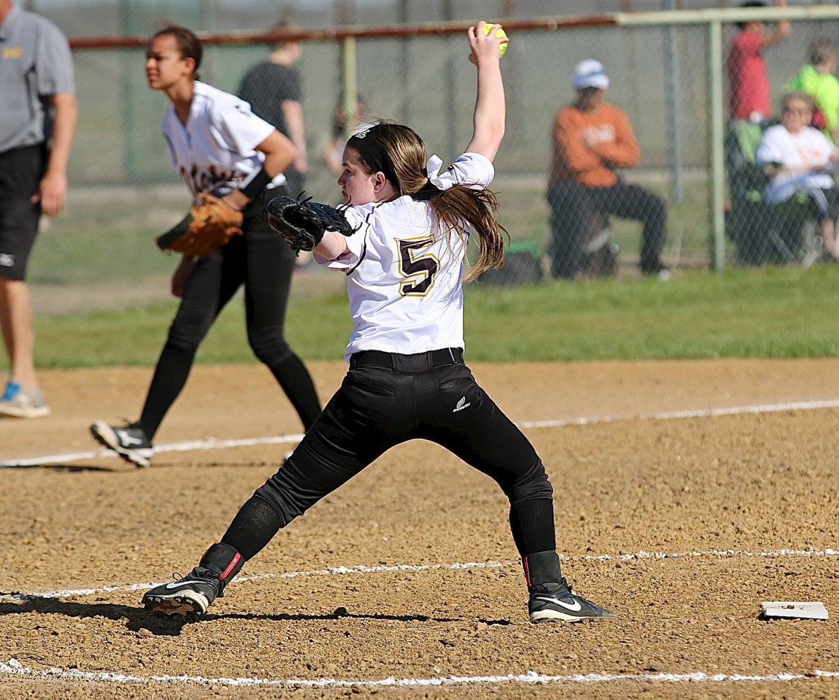 Image: Pitcher Tara Wallis(5) brings the heat.