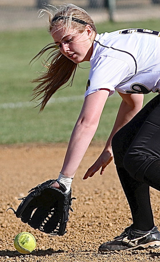 Image: Madison Washington(2) covers a grounder during a warm up.