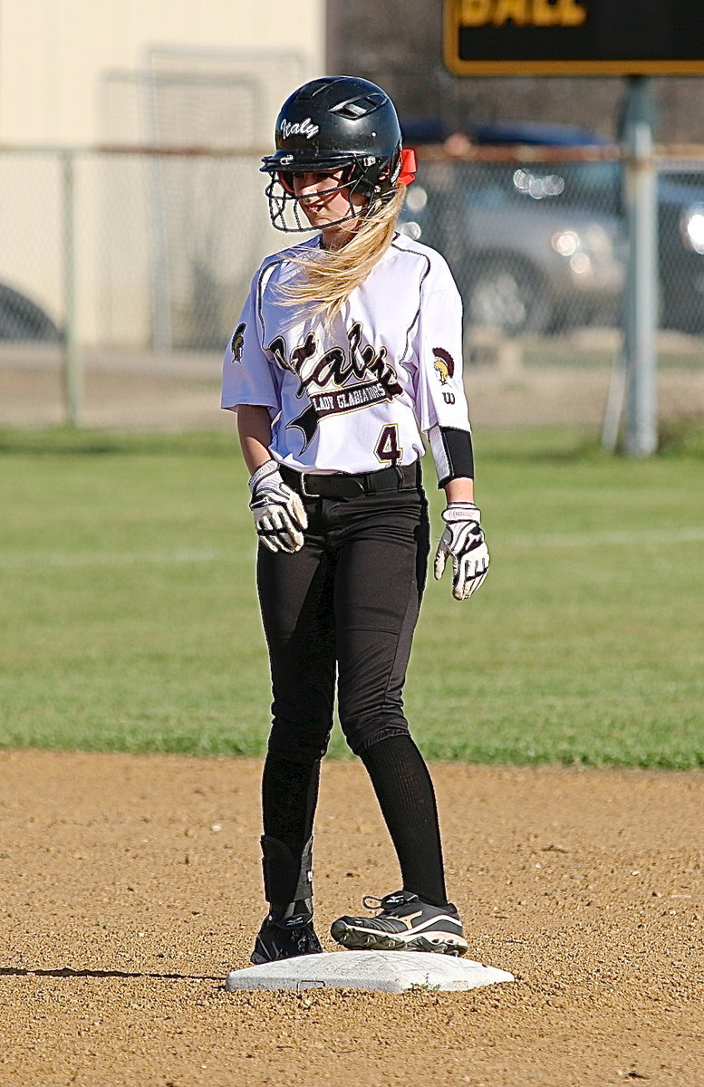 Image: Britney Chambers(4) tags up at second-base.