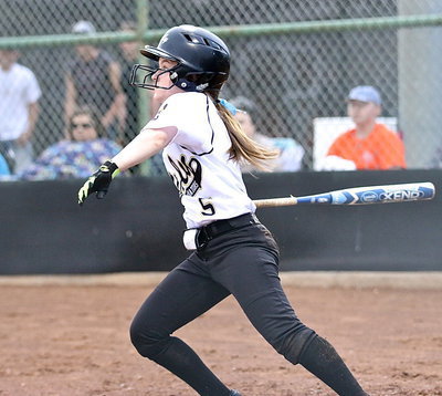 Image: Tara Wallis(5) hits a single and then gets to second-base on an overthrow.
