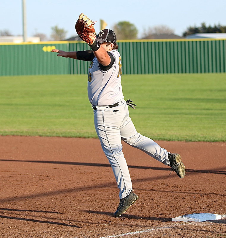 Image: Kevin Roldan(16) and the Gladiators soar away with the win against the Eagles as Roldan comes off the bag to make the catch and then makes the tag for an out.