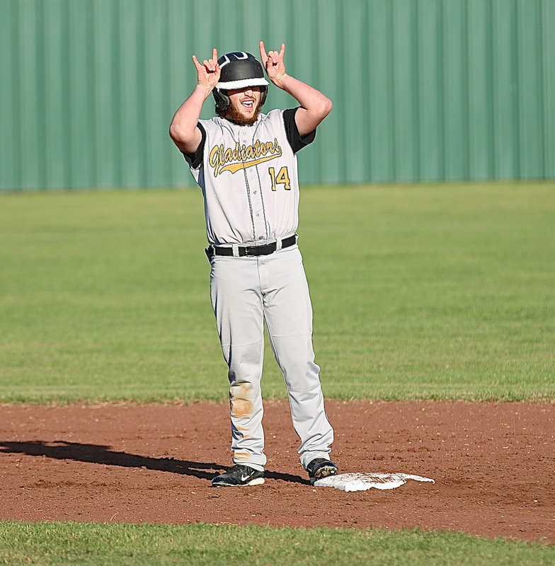 Image: Kyle Fortenberry(14) celebrates reaching second-base.