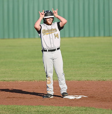 Image: Kyle Fortenberry(14) celebrates reaching second-base.
