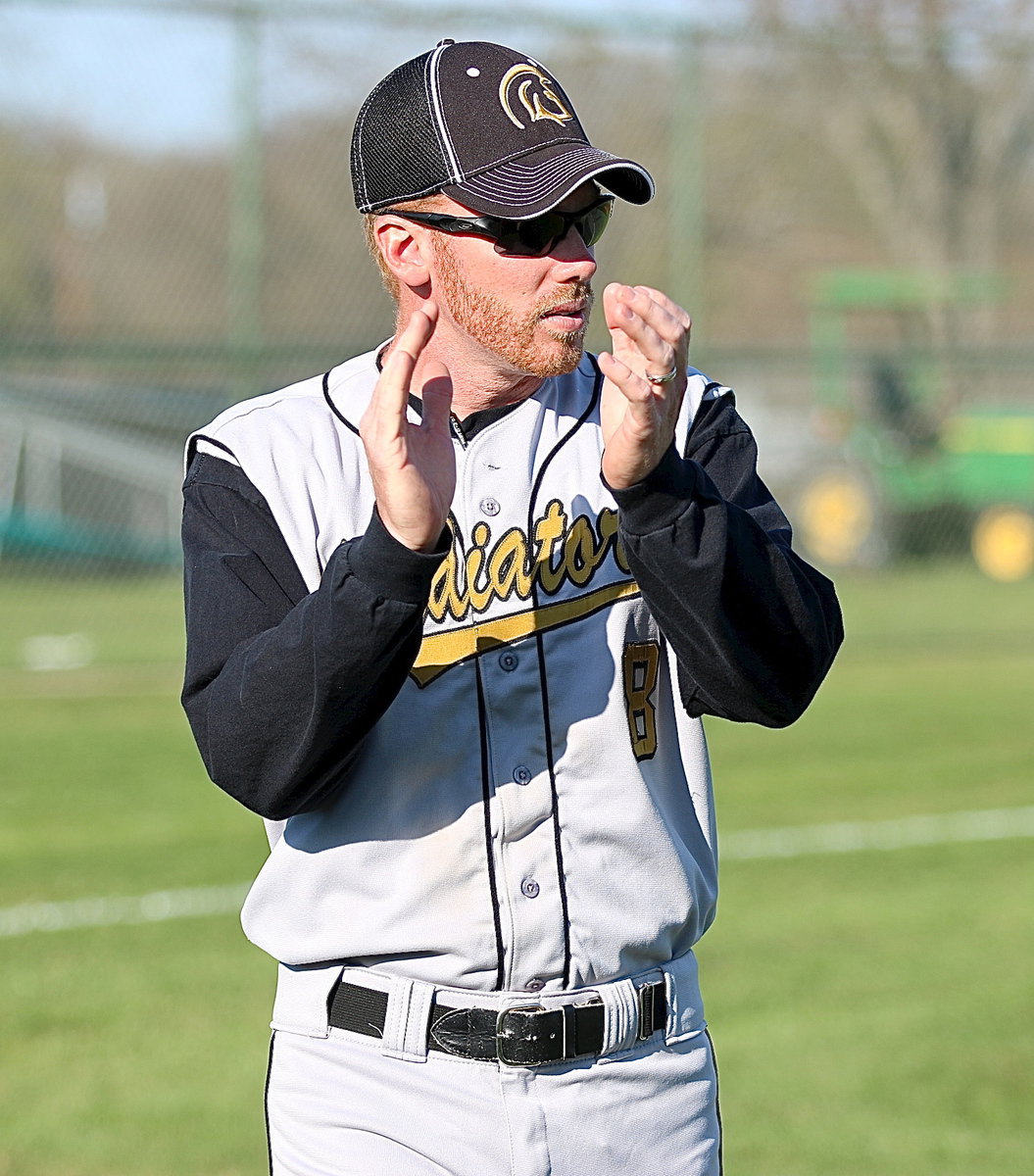 Image: Gladiator head coach Jon Cady(8) likes what he sees as Italy opens district with a 24-1 win over Grand Prairie Advantage Academy.