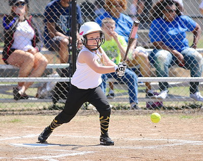 Image: Azlin Itson hits a single against Itasca during Italy’s Coach Pitch Girls game.