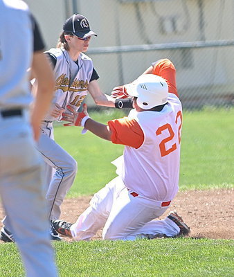 Image: Italy’s Ty Windham(12) makes the tag at second-base to end the game against Avalon.