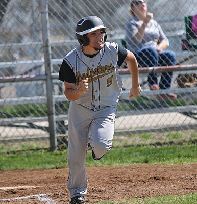 Image: Tyler Anderson(9) makes some noise early with a single shot into Avalon’s outfield.