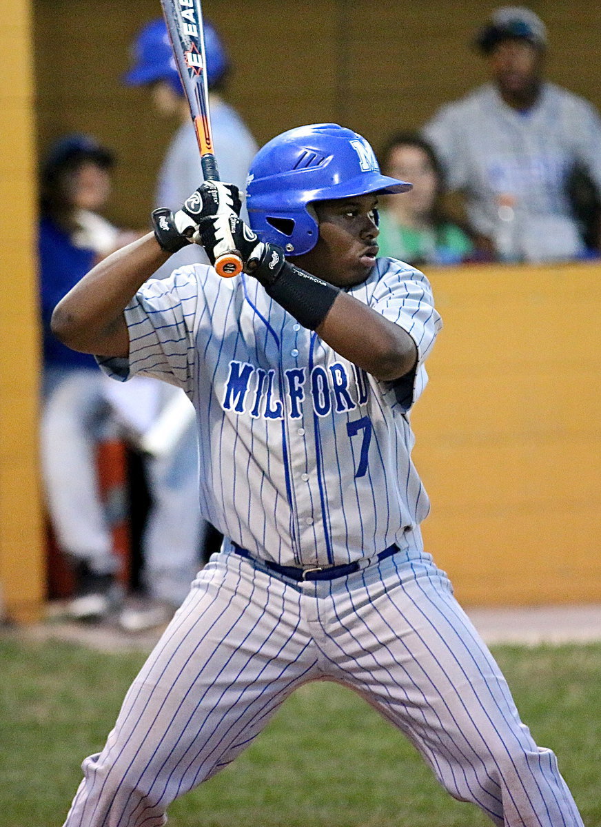 Image: During the fifth-inning, Jacarvus Gates(7) puts Milford on the board first with an RBI into right field.