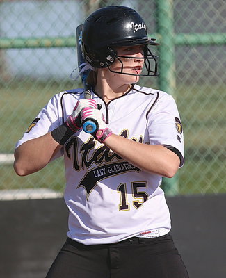 Image: Jaclynn Lewis(15) settles in at the plate.