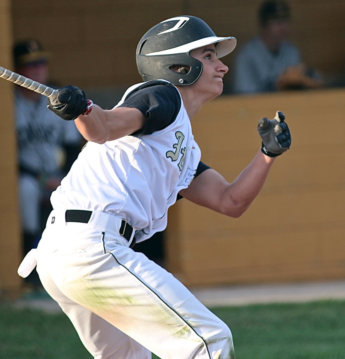 Image: Italy’s Levi McBride(1) hits his way onto base to get the action started.