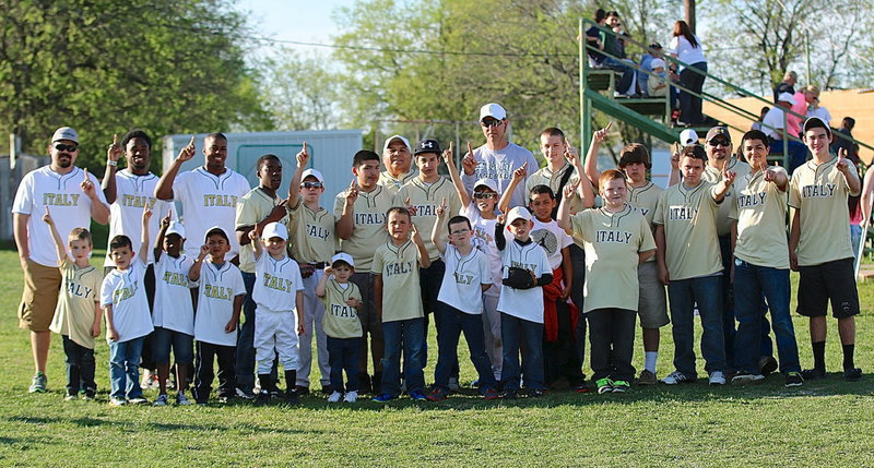 Image: IYAA President Charles Hyles (6’,4", white hat in the center. Really, you can’t miss him) poses with his players and coaches that were on hand to represent Italy’s local you sports organization.