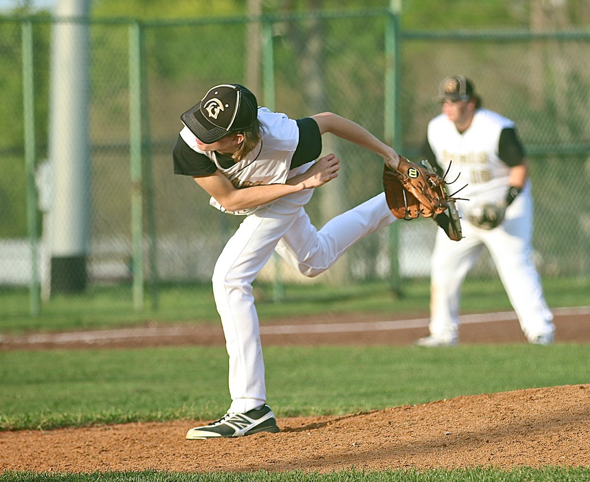 Image: Ty Windham(12) delivers one of his 13 first pitch strikes.