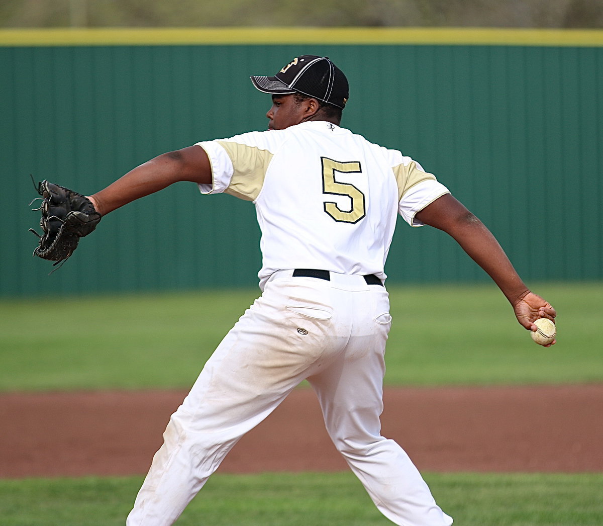 Image: Kenneth Norwood, Jr.(5), closes out the game for the JV Gladiators who pull together for a comeback win over MIlford, 8-7.