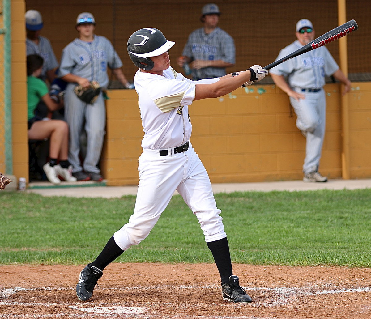 Image: Joe Celis(8) begins a 5 run rally for the JV Gladiators in the bottom of the fourth-inning with a triple into left field.