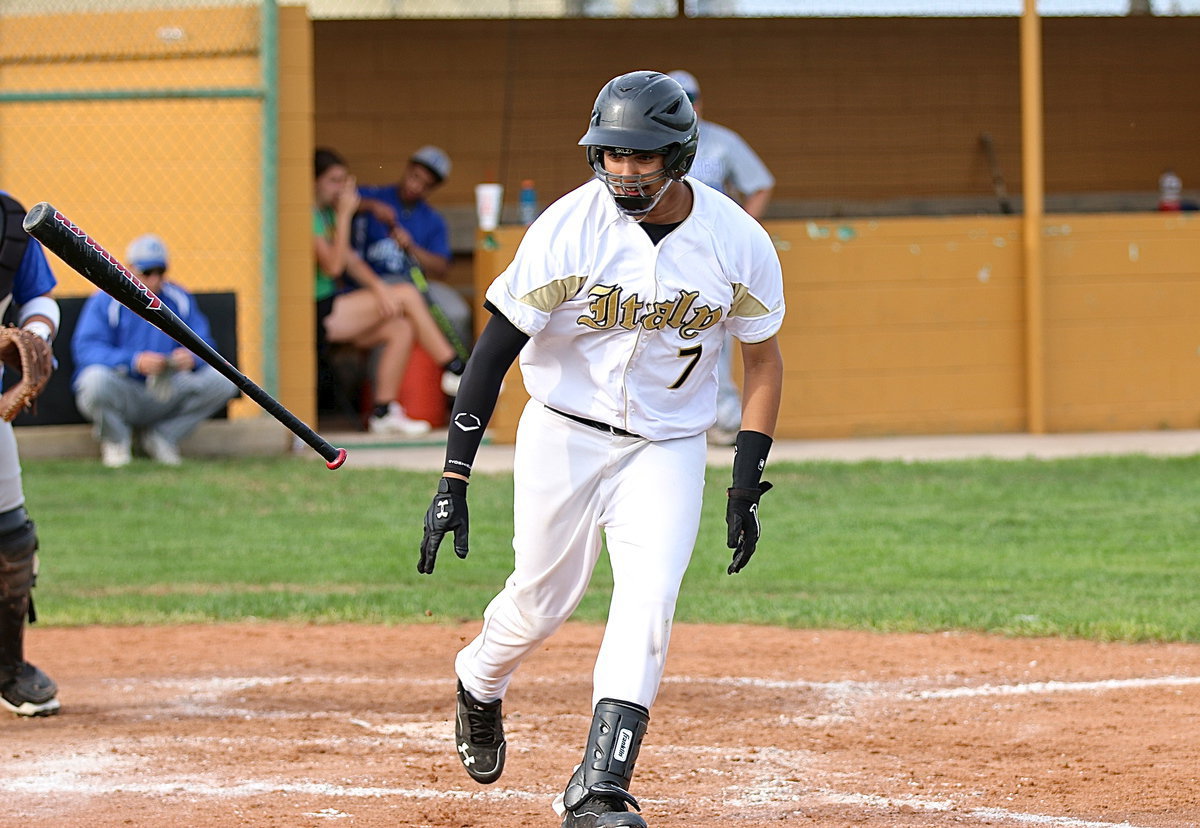 Image: Tristan Cotten(7) earns a walk and is unable to mask his enthusiasm about doing so.