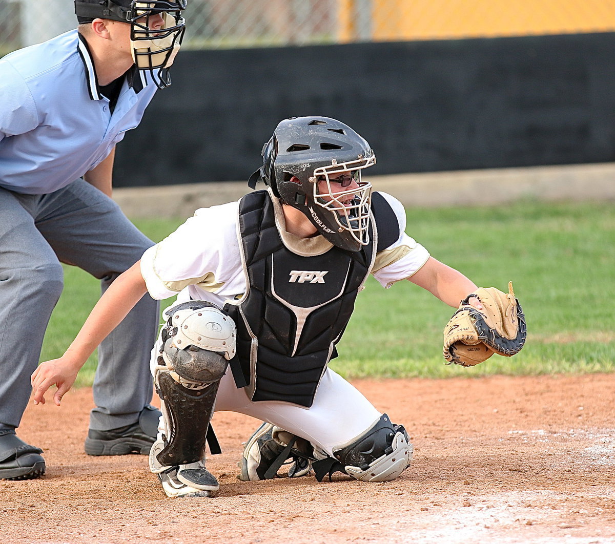 Image: Eli Garcia(3) pulls in a strike three for the third out from pitcher Kenneth Norwood, Jr. to keep the game tied 7-7 going into Italy’s final at bat.