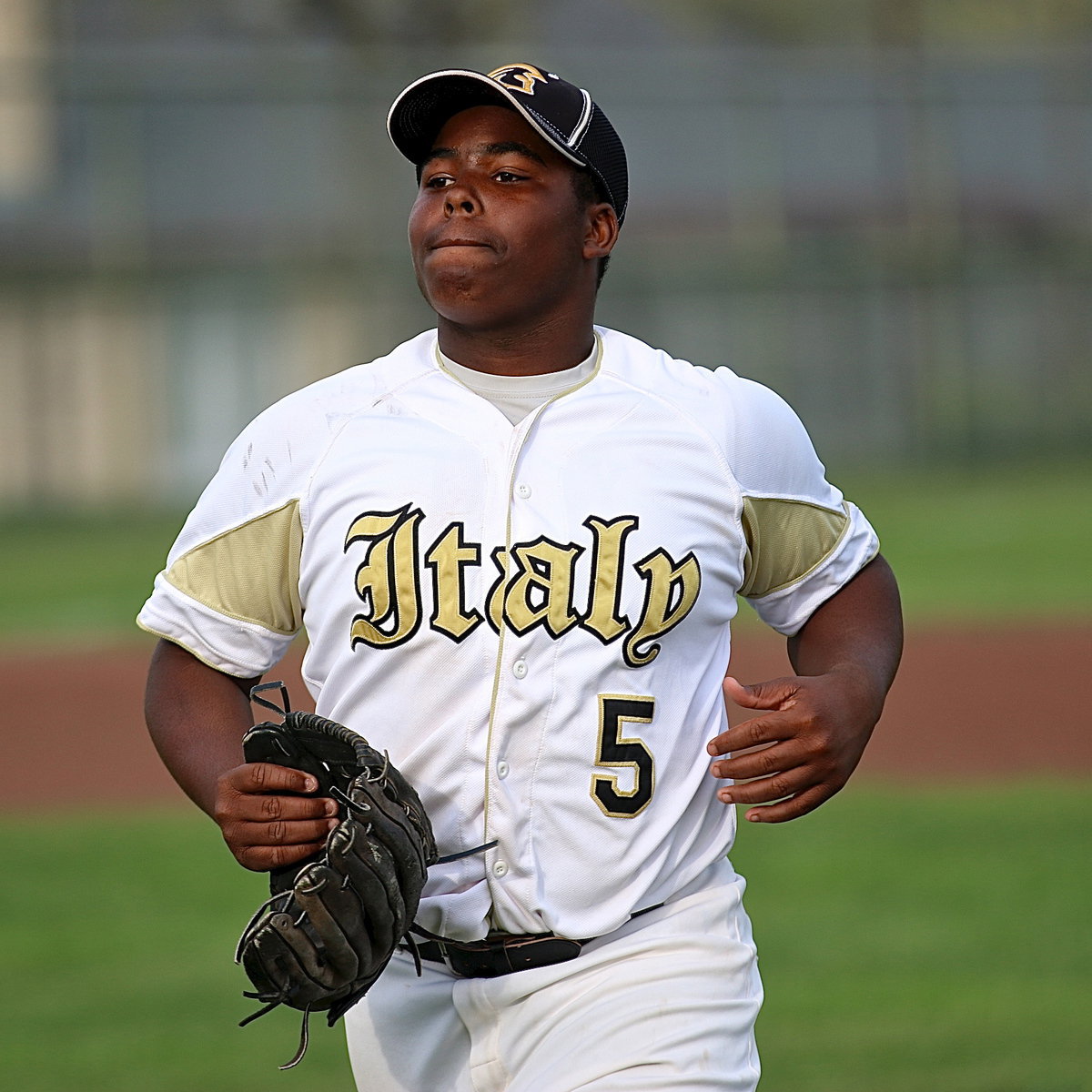 Image: Pitcher Kenneth Norwood, Jr.(5), gives his guys a chance as Italy heads in for their final at bat.