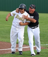 Image: Coach Cate congratulates Pedro Salazar(12) after Salazar pulls thru with the game winning walk off hit. Italy’s JV beats Milford 8-7 thanks to Salazar’s heroics!