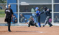 Image: Lady Gladiator catcher Lillie Perry(9) pulls in a third strike call against a Frost batter from pitcher Jaclynn Lewis(15) early in the game.