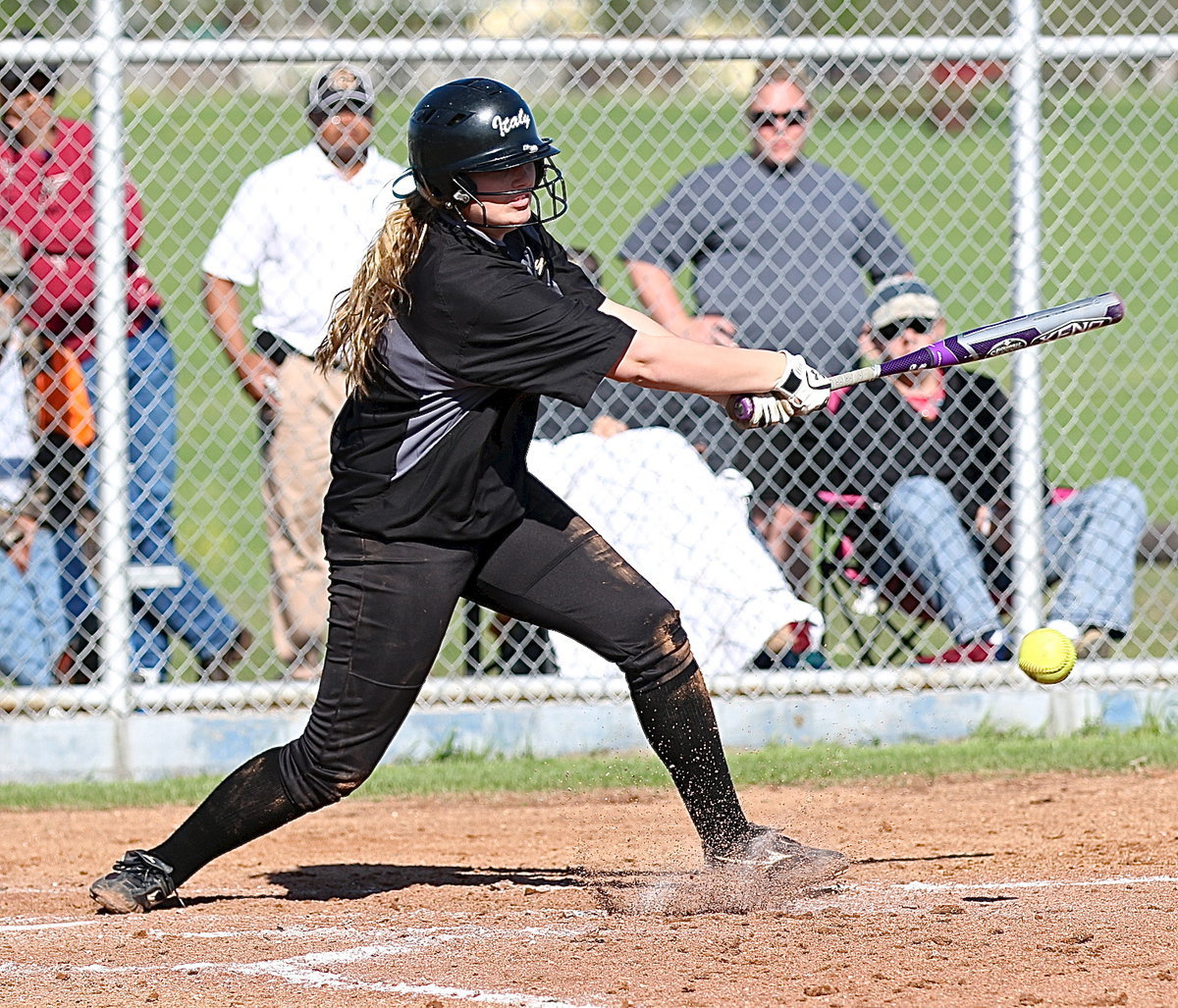 Image: Madison Washington(2) is good for a grounder and trip to first-base allowing teammate April Lusk to go from first to third-base.