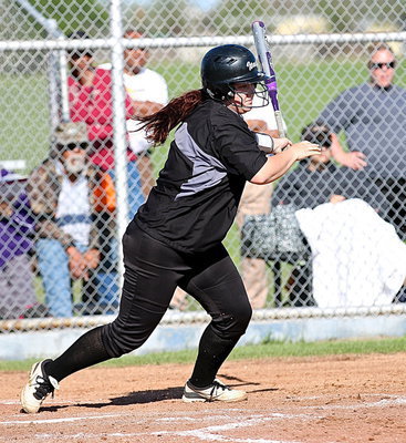 Image: Paige Westbrook(10) puts pressure on the Frost defense with a first-base reaching grounder.