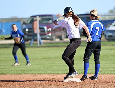 Image: Lillie Perry(9) smacks a key double in the top of the seventh-inning to represent the go ahead run for Italy.