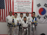 Image: Pictured top row:  Mario Perez-Black Belt-Milford, Amy Tinney-Black Belt-Hillsboro, Isamar Perez-Black Belt-Milford, Michael Russell-Italy.  Bottom Row;  Rocklin Ginnett-Italy and Nick Sam-Italy.  Two students were not pictured Javier and Michael Gonzalez.