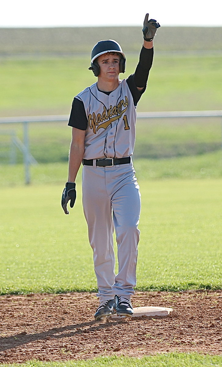 Image: Levi McBride(1) acknowledges his cheering dugout from second-base after recording an RBI double.