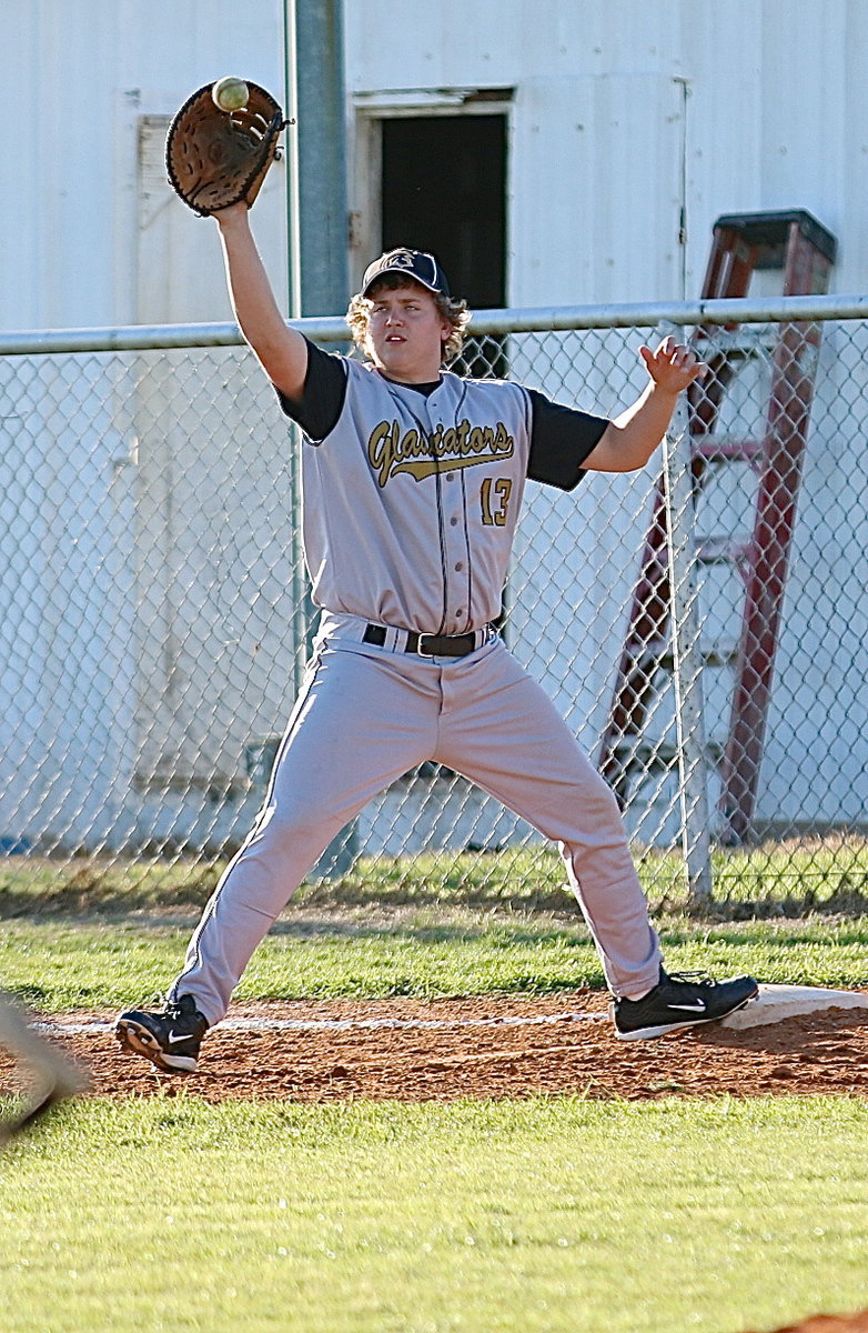 Image: Senior Bailey Walton(13) secures an out at first base for Italy.