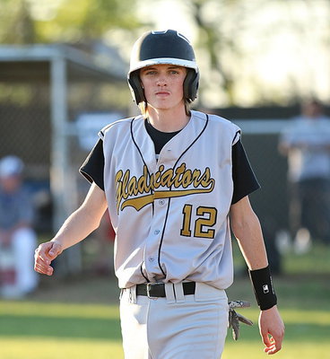 Image: Ty Windham(12) has the look of a district leader with the Gladiators walking tall atop the district standings.