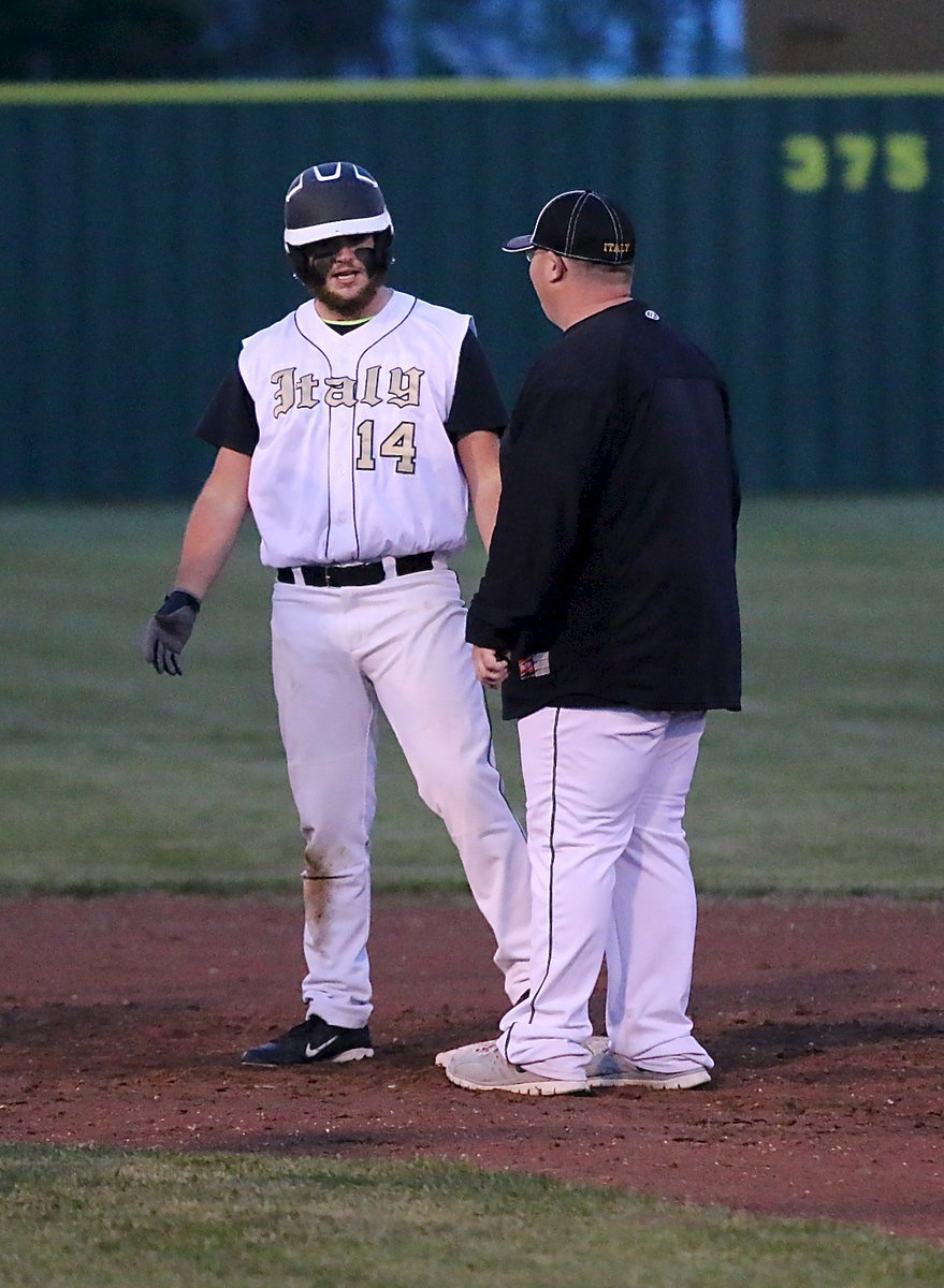 Image: Brandon Gansky gives Kyle Fortenberry(14) one last look after Fortenberry caught a ball with his face.