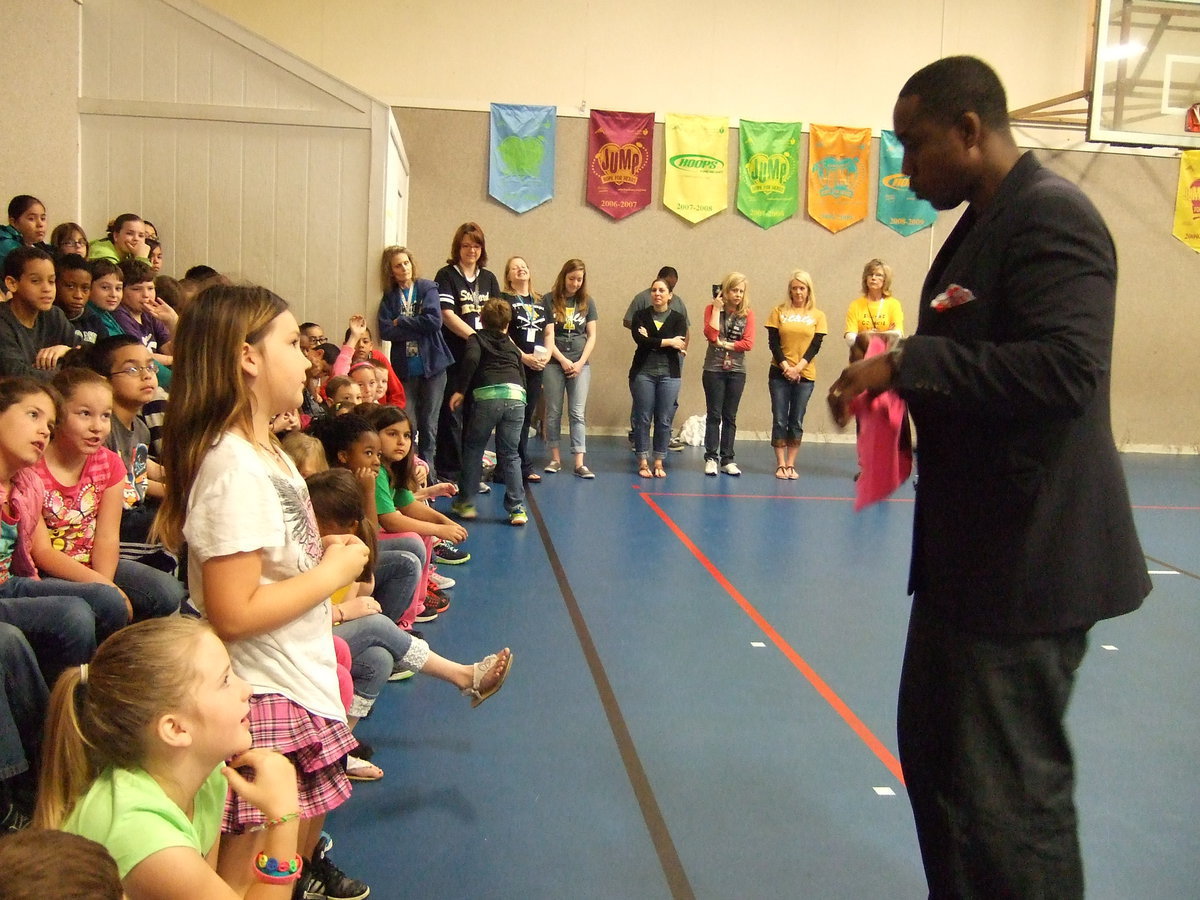 Image: Ray Schufford answering a question this young lady had about taking the STAAR test.