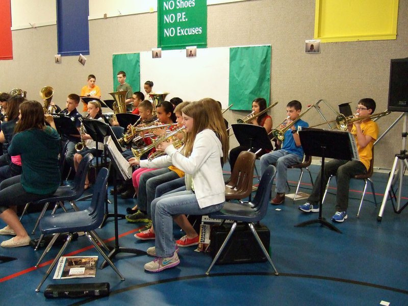 Image: Sixth grade band playing “We are the Champions.”