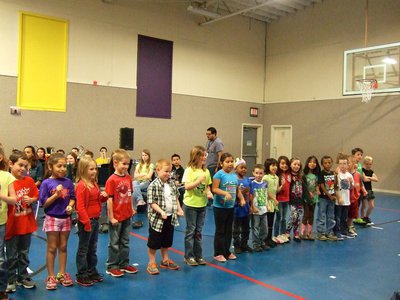 Image: First graders singing their song about the STAAR test.