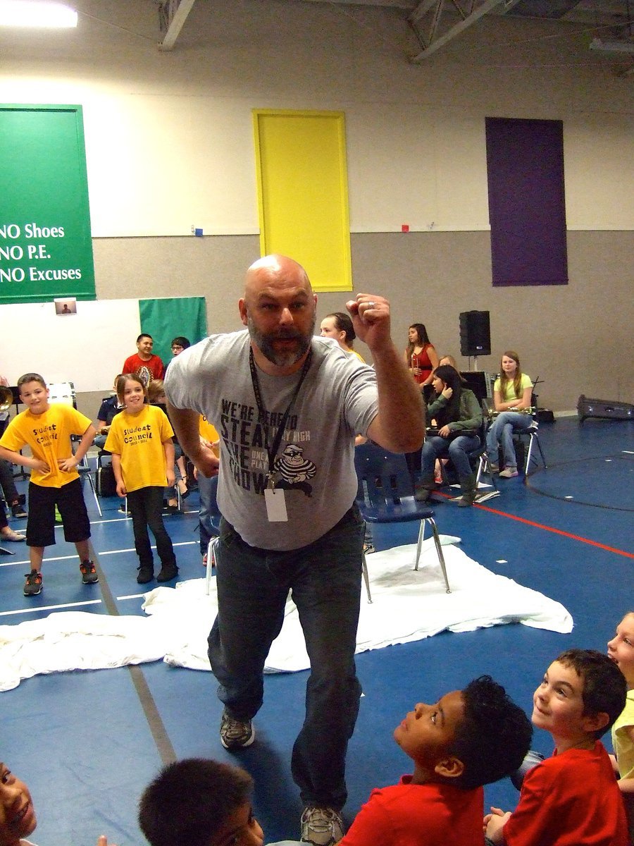Image: Mr. Joffre daring the students to throw a pie in his face!