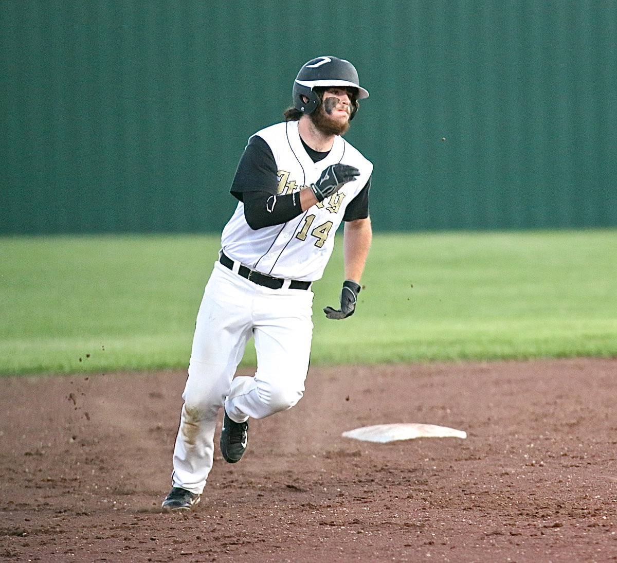 Image: And here he comes! Kyle Fortenberry(14) rounds second and eventually beats the relay to the plate for a 2 run inside-the-park-home run.