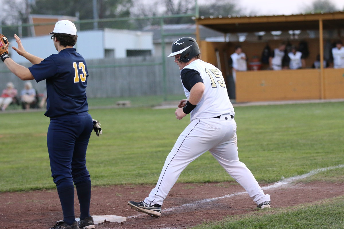 Image: Junior Gladiator Tyler Vencill(15) holds up at third-base, temporarily.