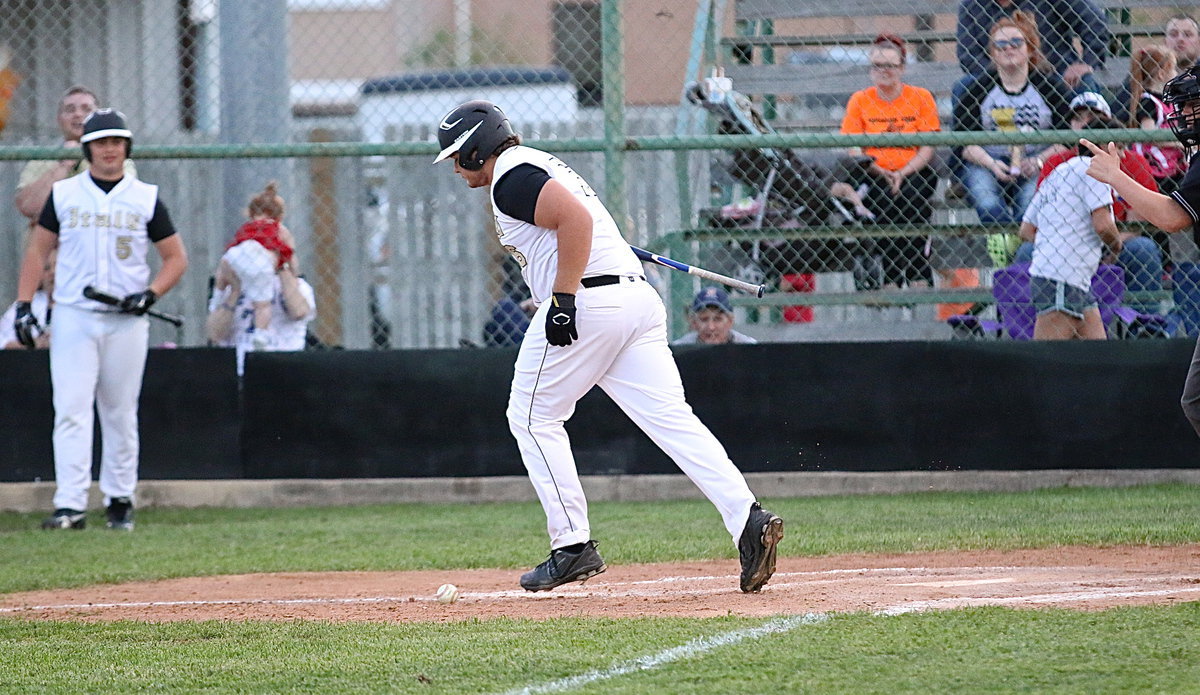 Image: Senior Gladiator Kevin Roldan(16) gets hit by a pitch and then is awarded first-base. Roldan has a knack for getting on base.