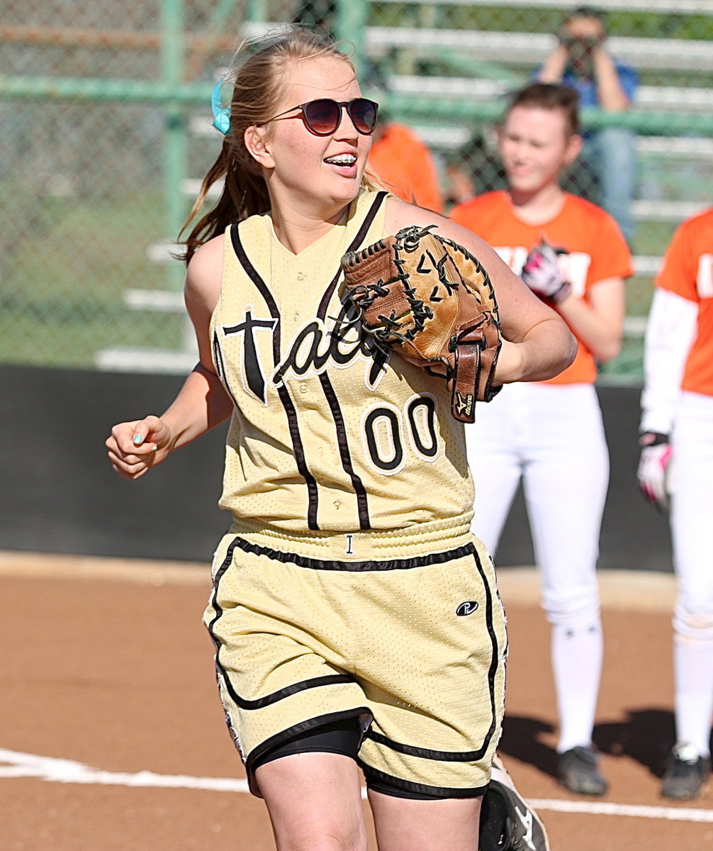 Image: Lady Gladiator Hannah Washington(00) takes the field, and eventually finds her base, after being introduced before the start of the game. Good job, Hannah!