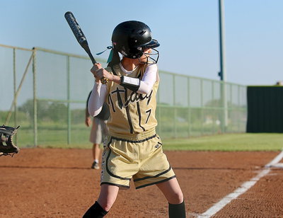 Image: Cassidy Childers(7) takes a turn at bat late in the game, popping one up to short.