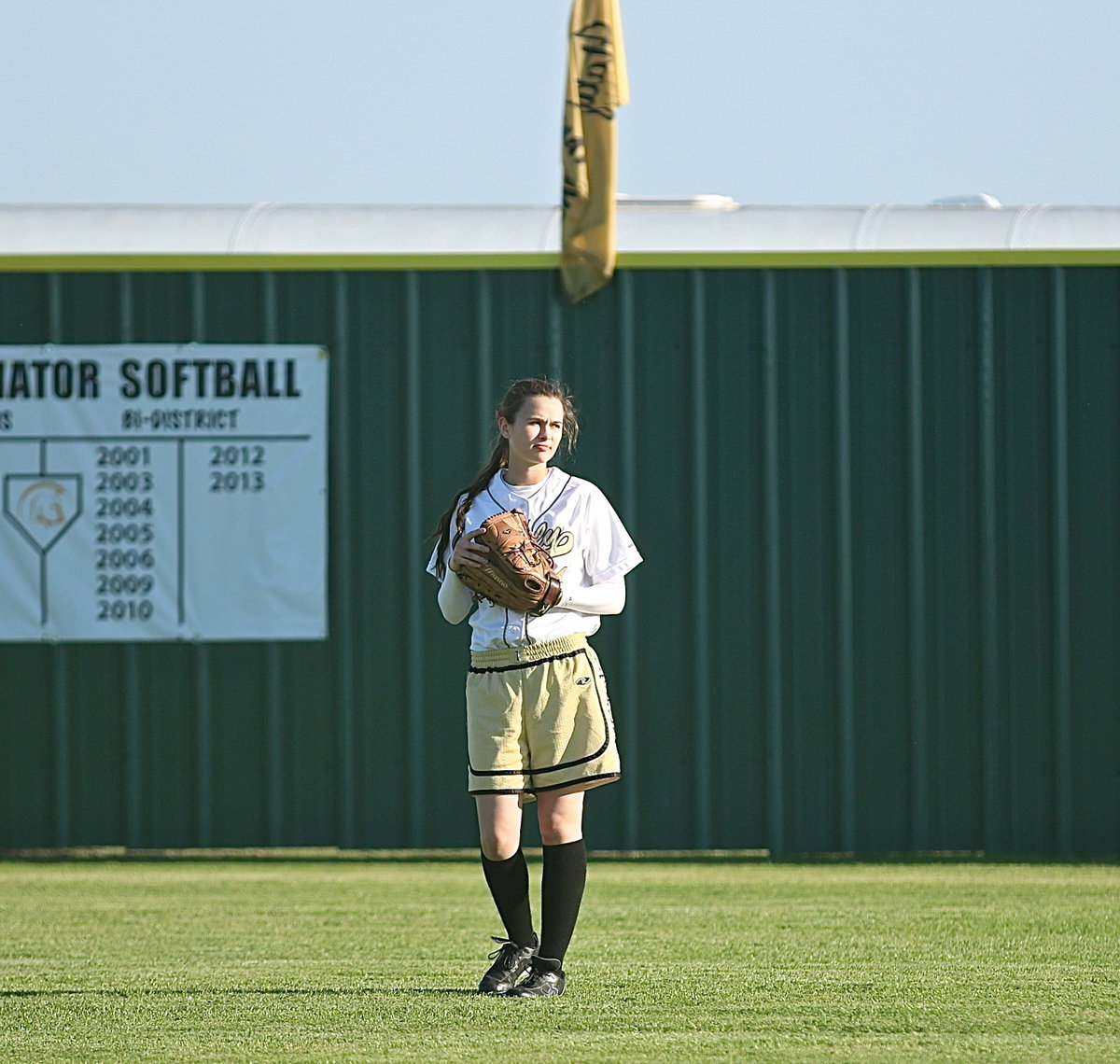 Image: Amber Hooker(4) plays left field for the Gladiators.