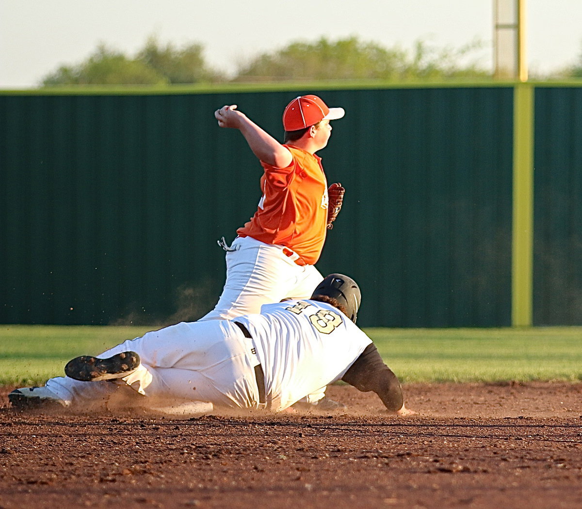 Image: Avalon manages to get a force out at second-base against Italy’s John Byers(18).