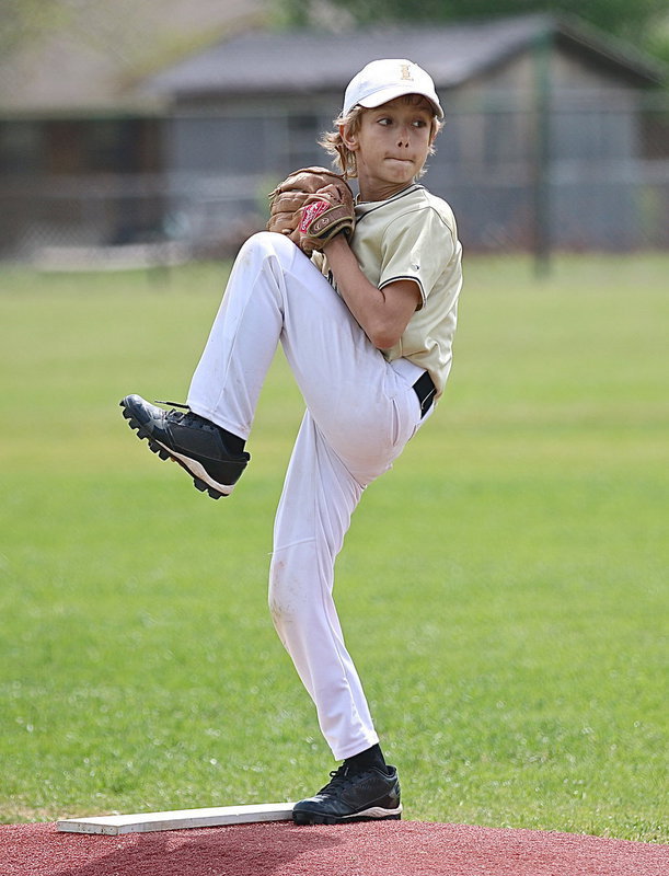 Image: Chase Hyles gets the job done on the mound for his IYAA baseball team during home games this past Saturday at Upchurch Ballpark.