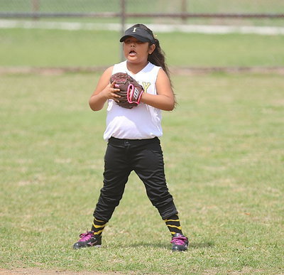 Image: Keeping her teammates fired up from all the way in the outfield.
