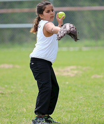 Image: Evie South with the form during pre-game warmups.