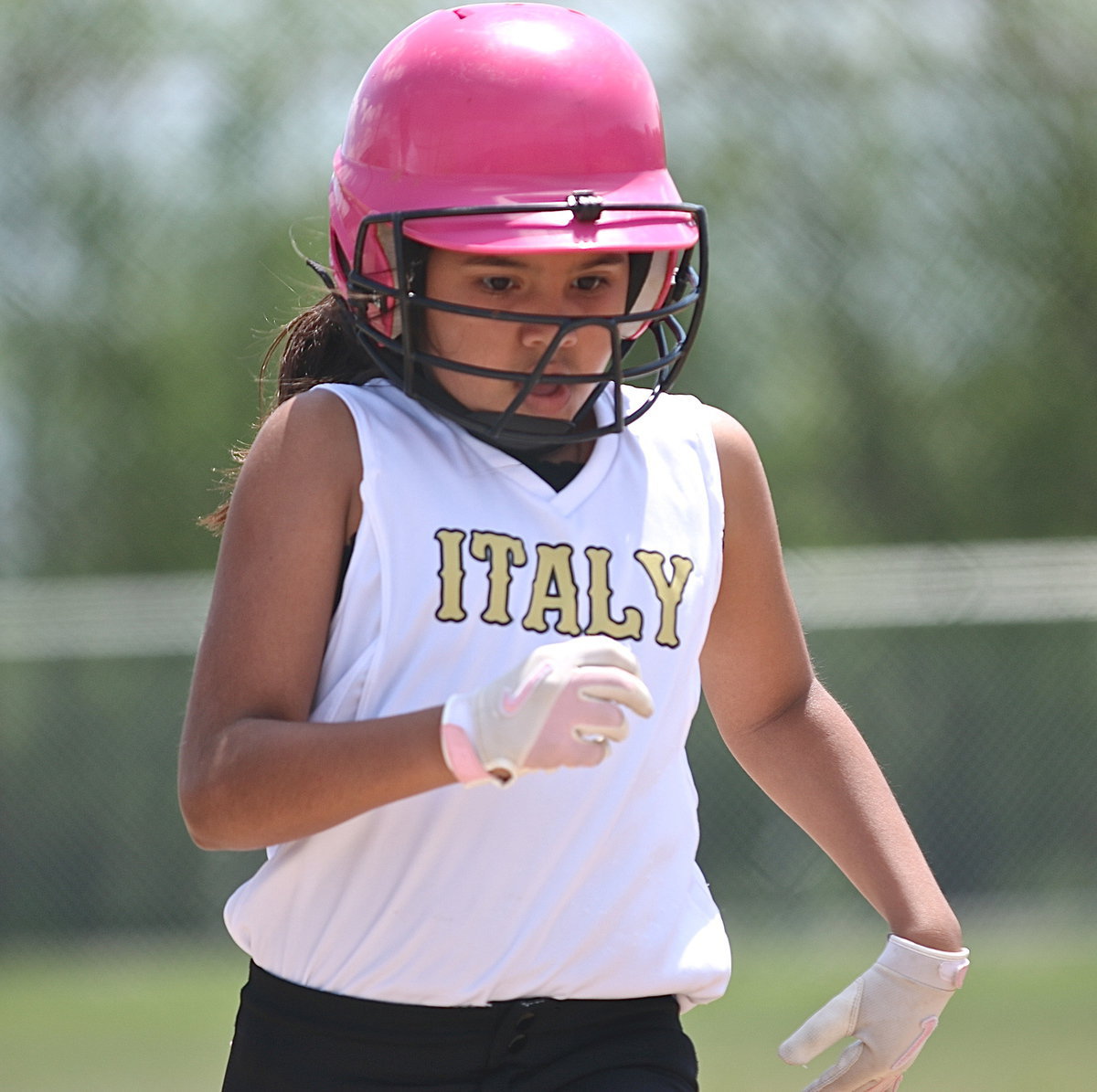 Image: Alyssa Wiser crosses home plate.