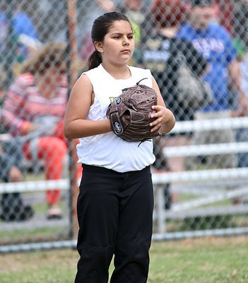 Image: Evie South looks determined to win the game.