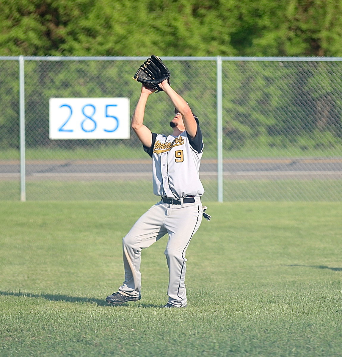 Image: Tyler Anderson(9) gets under a pop-up to make the catch from his shortstop position for the Gladiators.