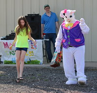 Image: The Easter Bunny, with Breyanna Beets inside the suit, joins in some line dancing with the kids to kickoff the annual Mayor’s Easter Egg Hunt at Upchurch Ballpark Saturday morning.